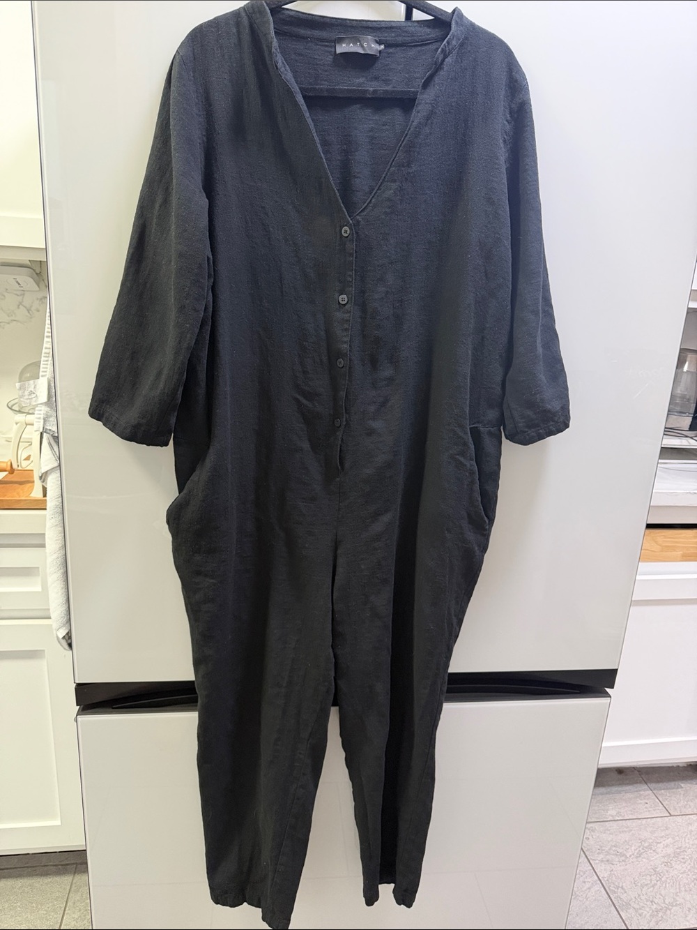 Hatch Relaxed Black Linen Jumpsuit with Front Buttons
